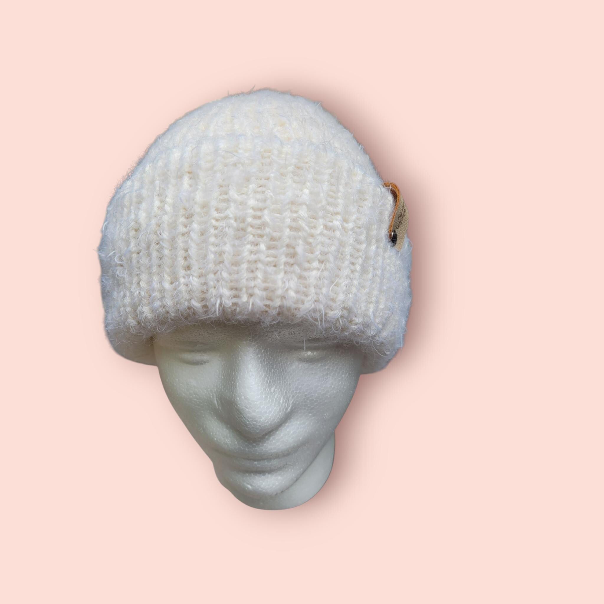 off-white merino wool hat, very soft and fluffy