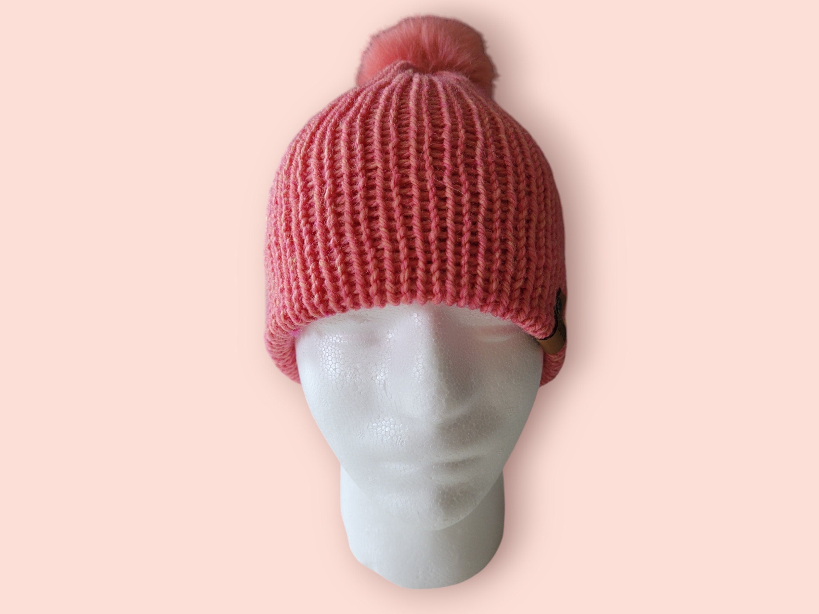woolen beanie hat with pompom size S-M in coral colour