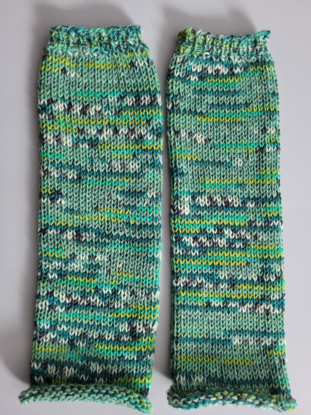 handmade leg warmers,  woolen and warm,  in greens