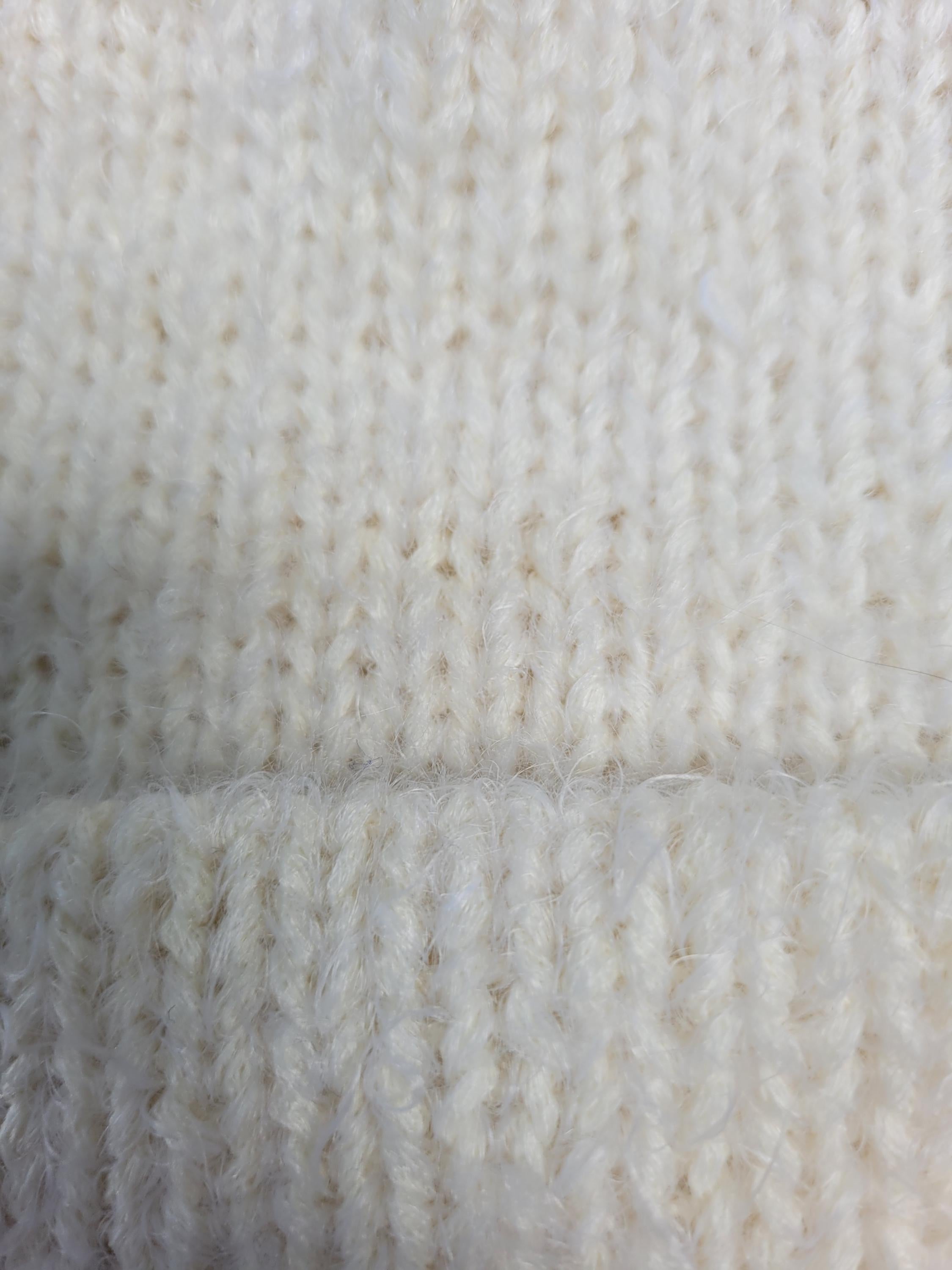 off-white merino wool hat, very soft and fluffy
